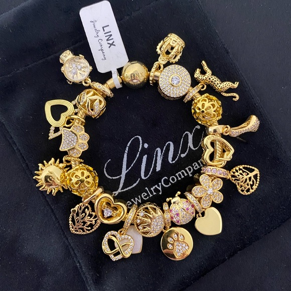 Linx Yellow Gold Bracelet with Gold and Cubic Zirconia Themed Charms